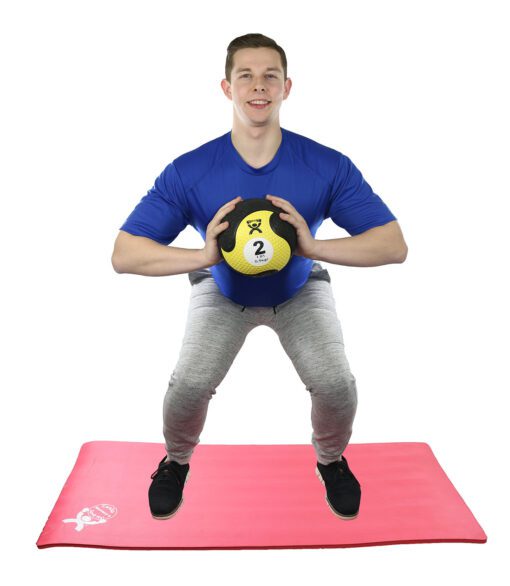 Enhance Your Workouts with Cando Firm Medicine Ball in Yellow, 2 Lbs. | Flamingo Sportswear